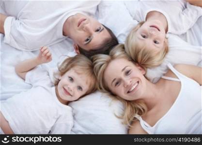 Young families with children on the bed