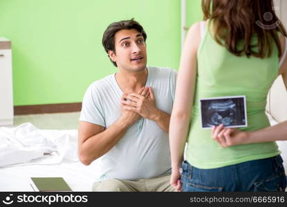 Young family finding out about pregnancy