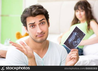 Young family finding out about pregnancy