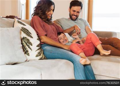 Young family having fun at home