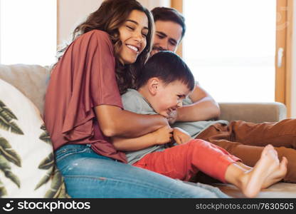 Young family having fun at home