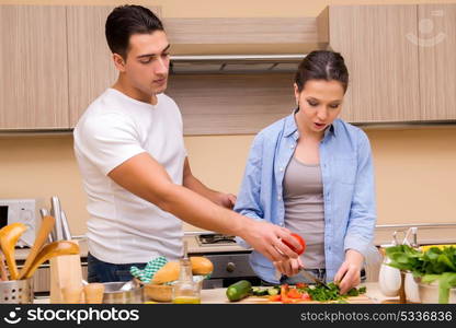 Young family in the kitchen