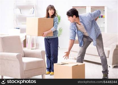 Young family moving in to new apartment after paying off mortgage. Young family moving in to new apartment after paying off mortgag