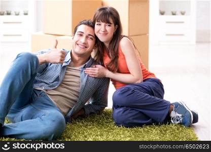 Young family moving to new house after final payment