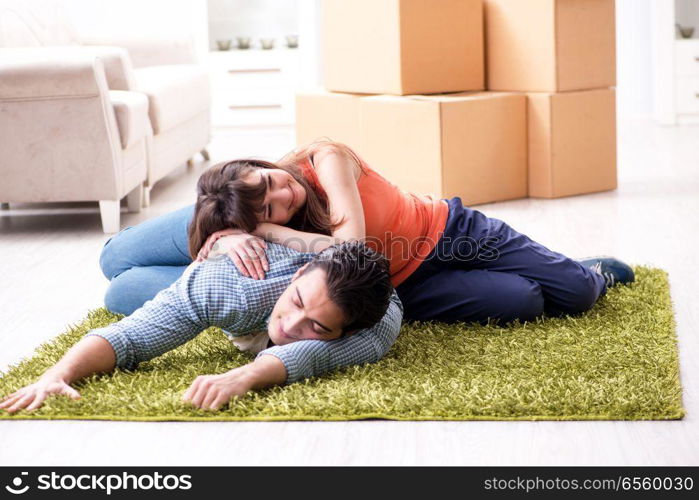 Young family moving to new house after final payment