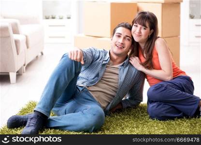 Young family moving to new house after final payment