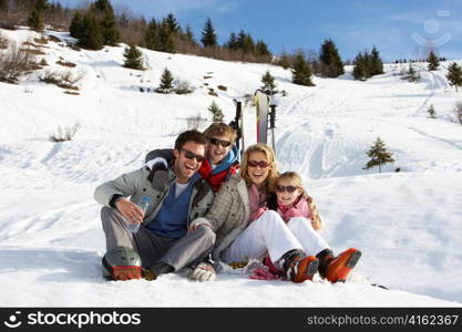 Young Family On Ski Vacation