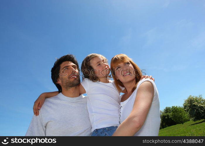 Young family outdoors on a sunny day