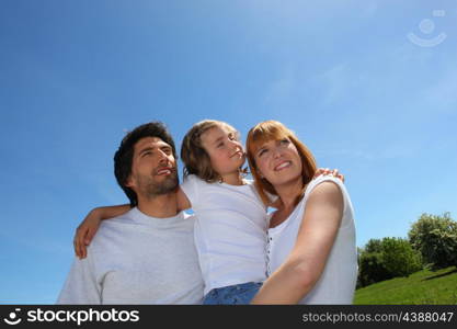 Young family outdoors on a sunny day