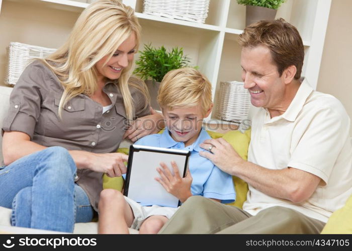 Young Family Parents & Boy Son Using Tablet Computer