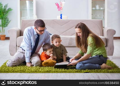 Young family playing in the room at home