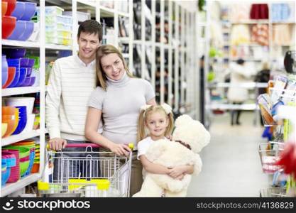 Young family shopping