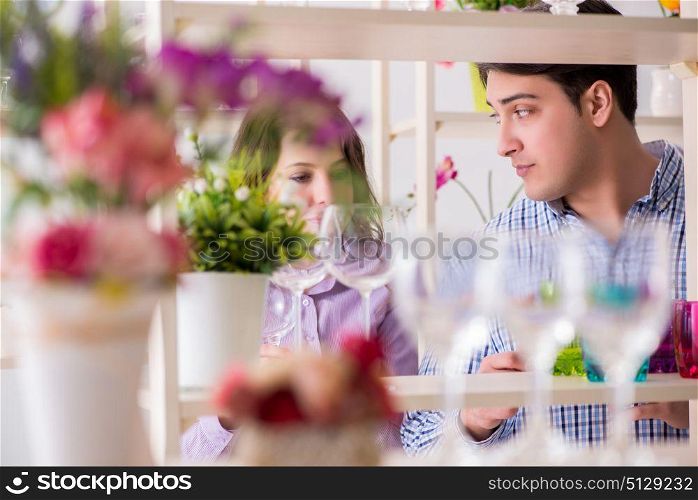 Young family shopping in shop