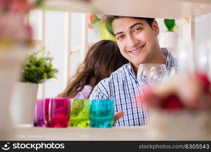 Young family shopping in shop