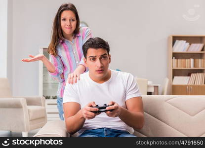 Young family suffering from computer games addiction