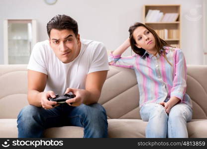 Young family suffering from computer games addiction