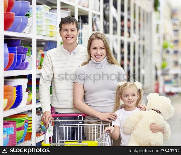 Young family with a child in a store