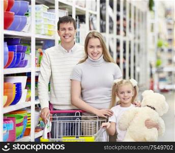 Young family with a child in a store