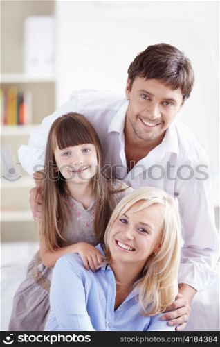 Young family with a daughter at home