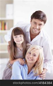 Young family with a daughter at home