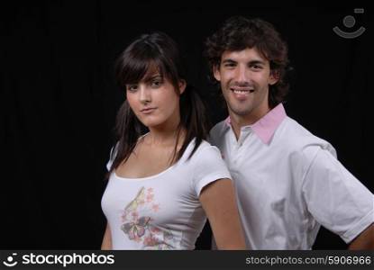 young fashion couple portrait in studio shot