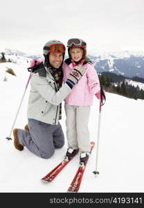 Young Father And Daughter On Ski Vacation