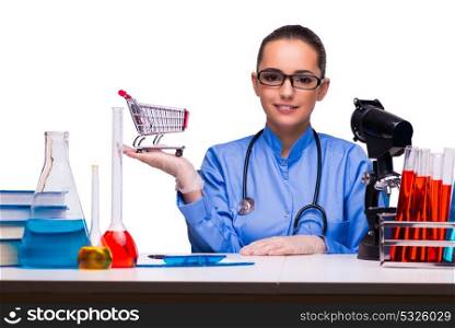 Young female doctor in lab isolated on white