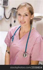 Young Female Doctor In Pink Scrubs
