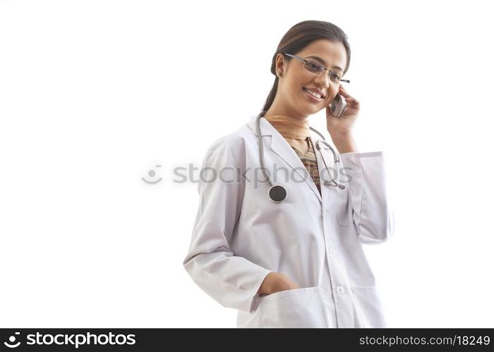 Young female doctor on call isolated over white background