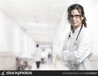 Young female doctor on the corridor of the hospital.