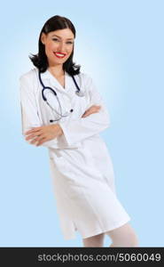 young female doctor portrait. Portrait of happy successful young female doctor holding a stethoscope