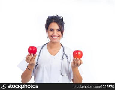 young female doctor showing two beautiful red apples