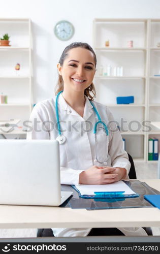 Young female doctor working in the clinic