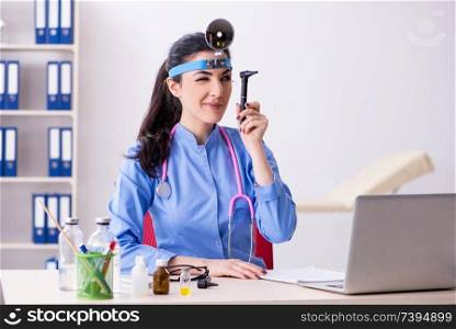 Young female doctor working in the clinic 