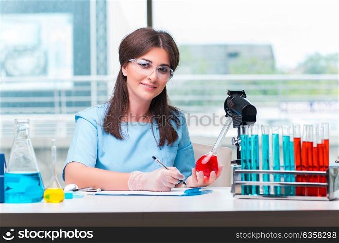 Young female doctor working in the lab