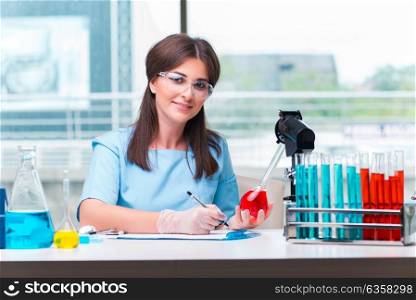 Young female doctor working in the lab