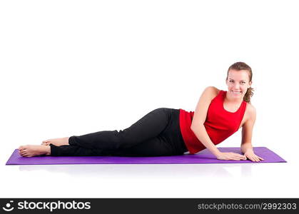 Young female doing exercises on white