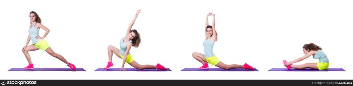 Young female doing exercises on white