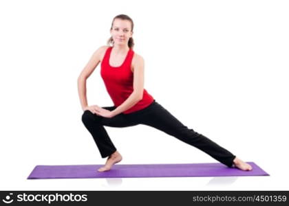 Young female doing exercises on white