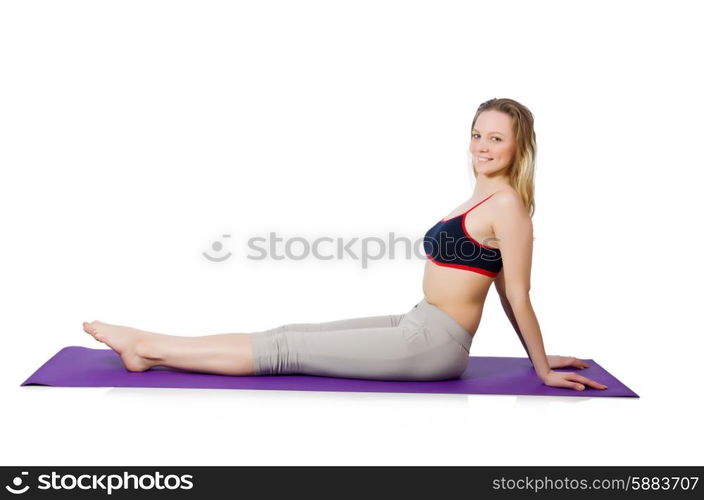 Young female doing exercises on white