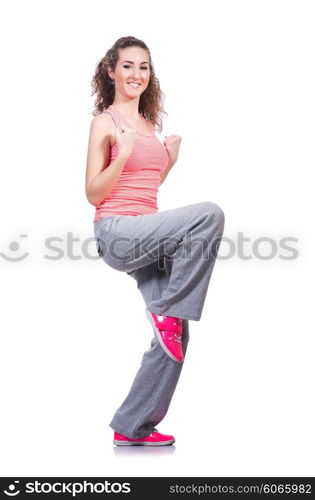 Young female doing exercises on white