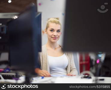 Young female Entrepreneur Freelancer Working Using A Laptop In Coworking space