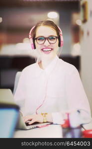 Young female Entrepreneur Freelancer Working Using A Laptop In Coworking space