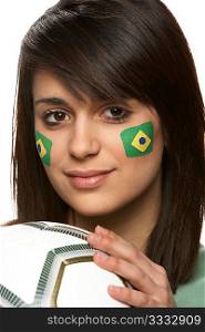 Young Female Football Fan With Brazilian Flag Painted On Face