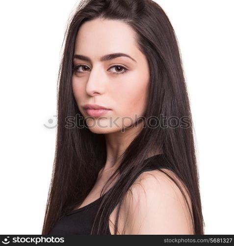 Young female model posing over white background