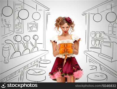 Young female Oktoberfest woman wearing a traditional Bavarian dress dirndl serving two beer mugs on grey sketchy bar counter background with bartender.