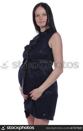 Young female pregnant - happy woman in studio