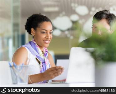 Young female professional in an office