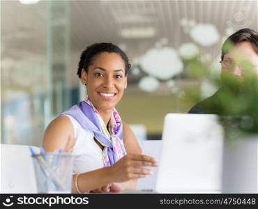 Young female professional in an office