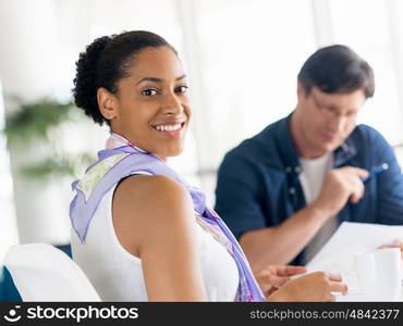 Young female professional in an office